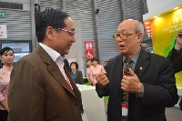 印工協(xié)理事長徐建國（左）與中印協(xié)名譽理事長武文祥